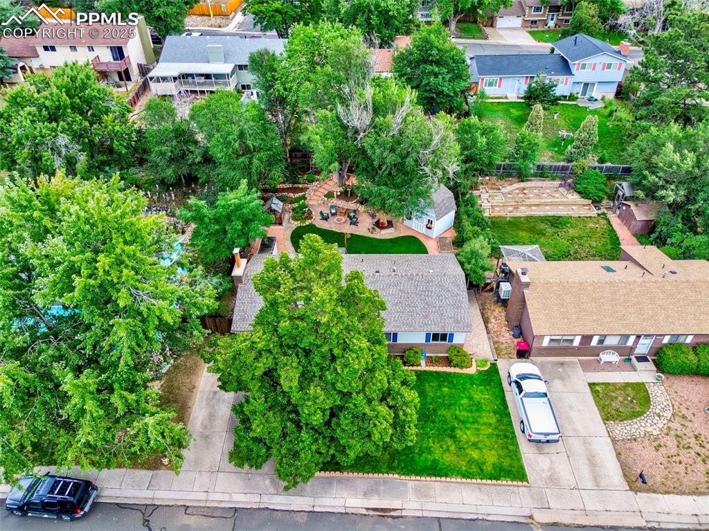 5139 Villa Circle Colorado Springs, CO 80918 - Photo 38 of 40 an aerial view of multiple houses with a yard