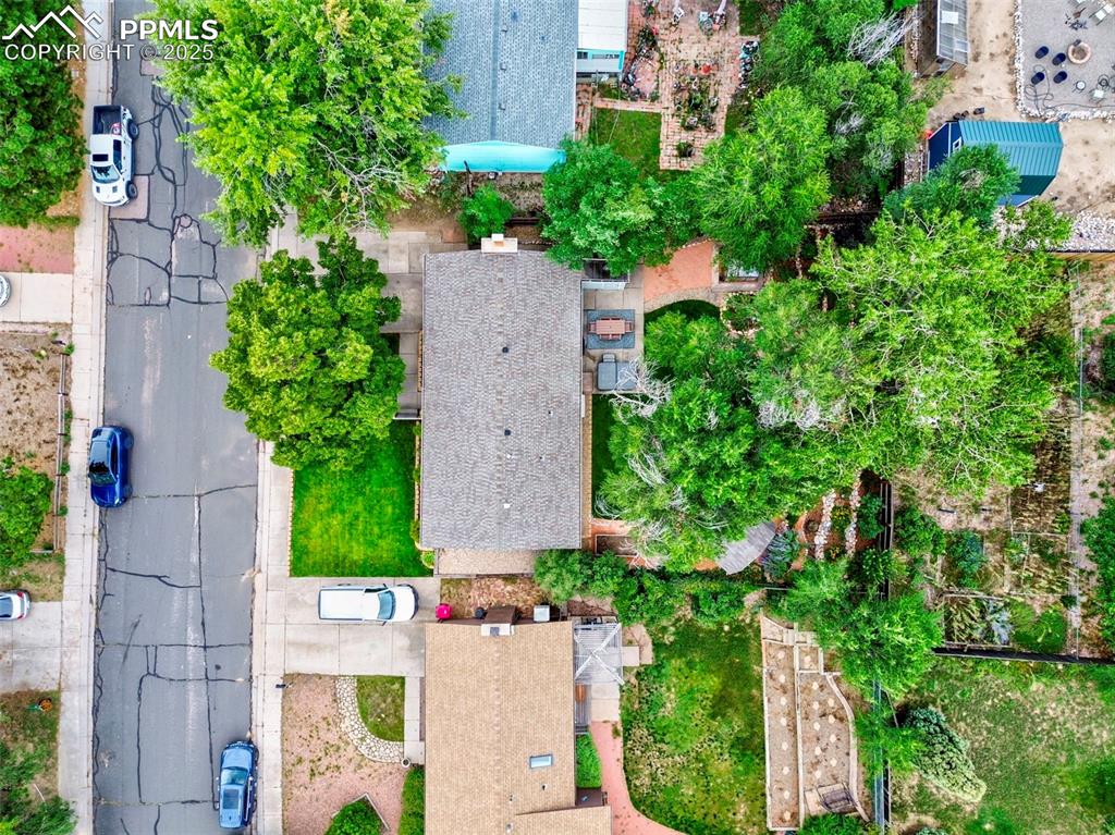 5139 Villa Circle Colorado Springs, CO 80918 - Photo 39 of 40 an aerial view of a house with a yard and garden
