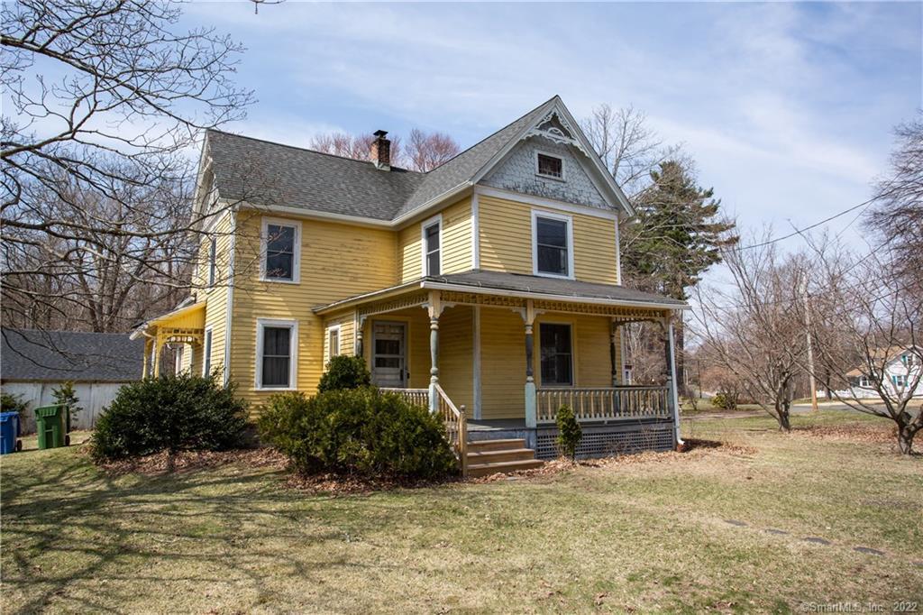 2 Maple Street Glastonbury, CT 06033 - Photo 1 of 1 a front view of a house with a yard