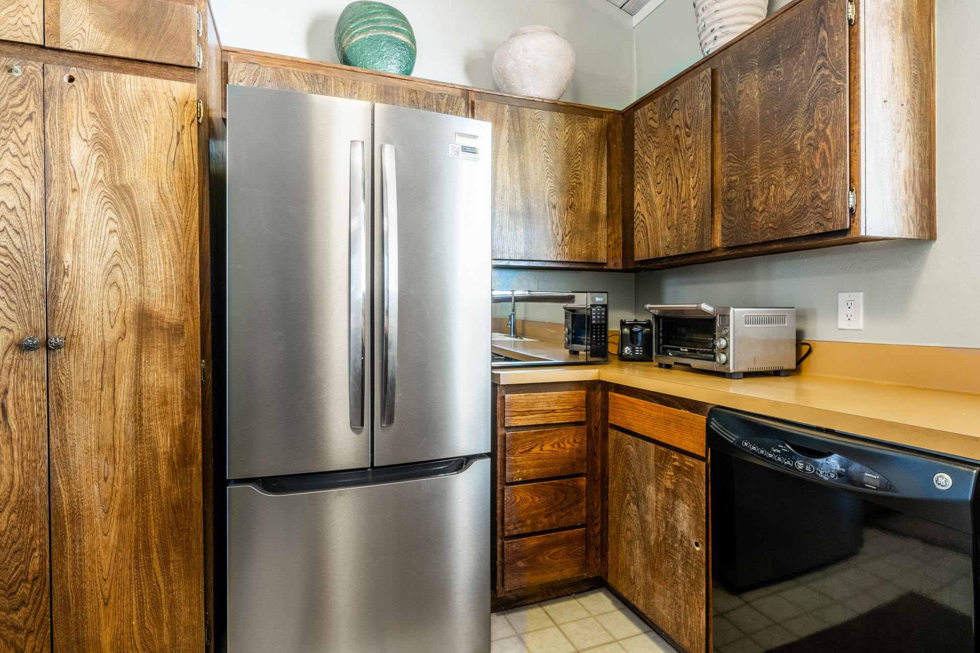 94 John Muir Road, Unit 132 Mammoth Lakes, CA 93546 - Photo 20 of 58 a kitchen with stainless steel appliances granite countertop a refrigerator and a sink