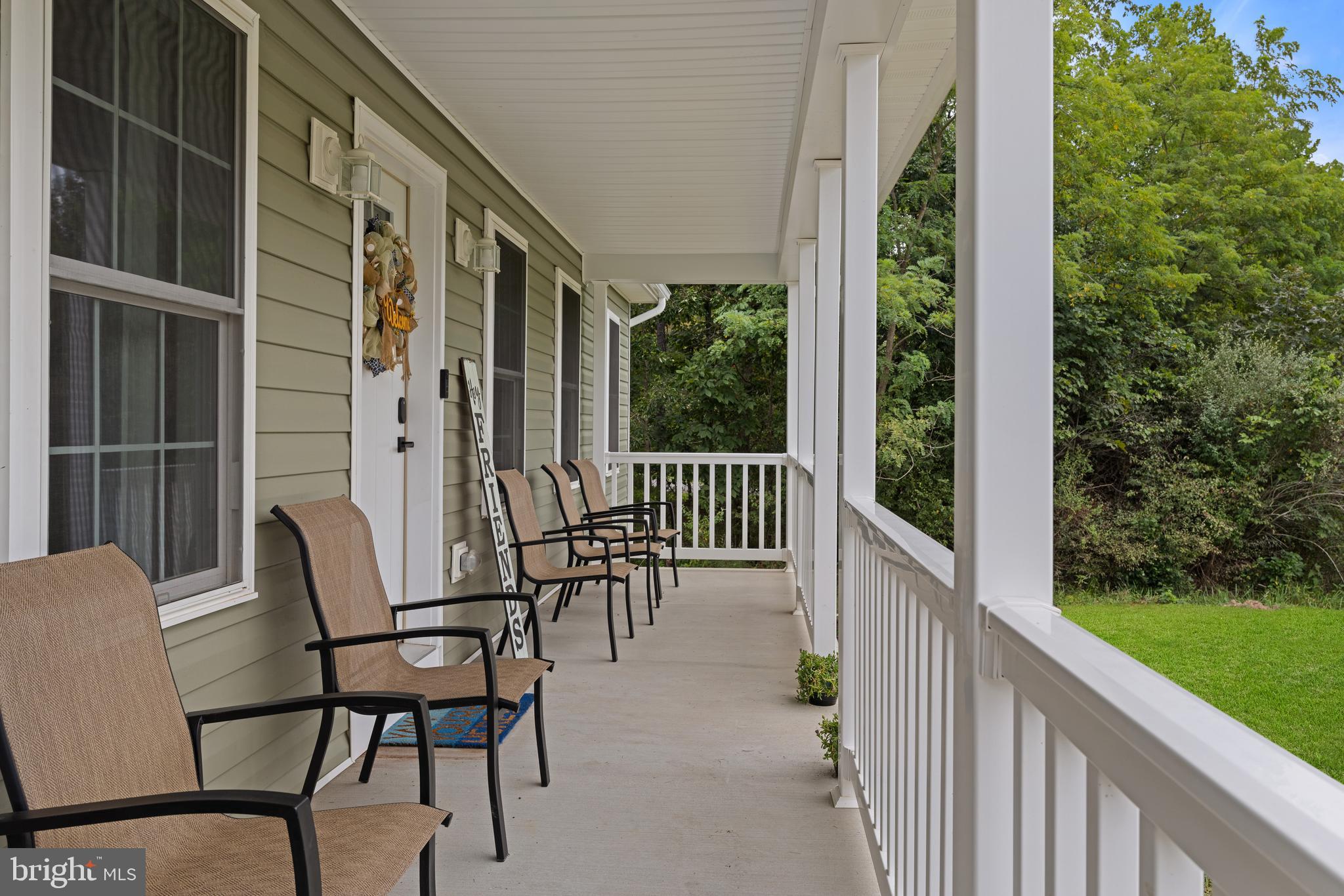 61 MDG Court Berkeley Springs, WV 25411 - Photo 13 of 47 Wile away the hours on this lovely front porch