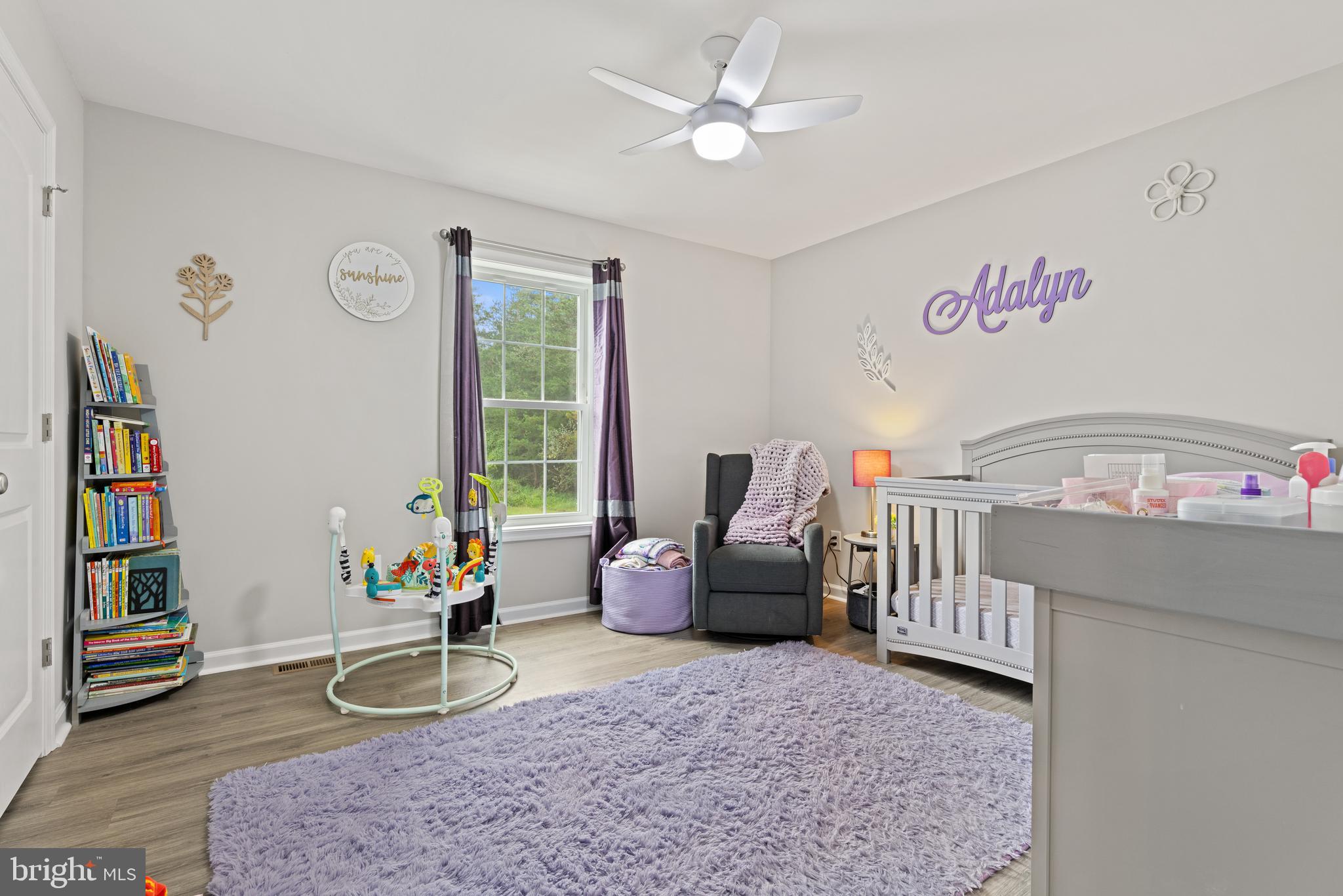61 MDG Court Berkeley Springs, WV 25411 - Photo 22 of 47 a bedroom with furniture and a wooden floor