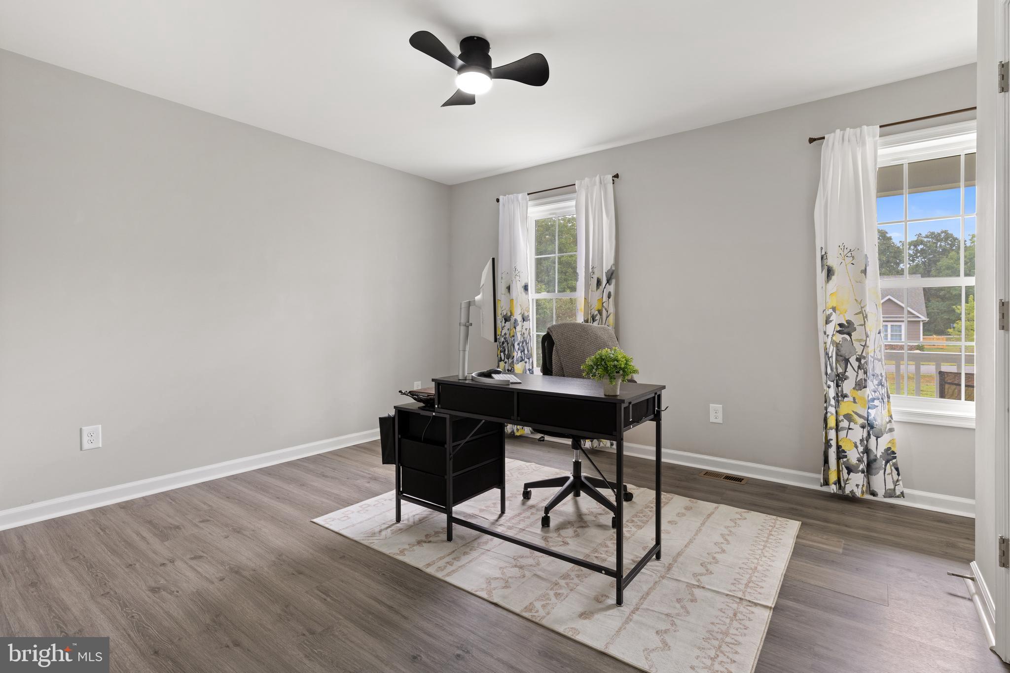 61 MDG Court Berkeley Springs, WV 25411 - Photo 25 of 47 a view of a workspace with furniture and a window