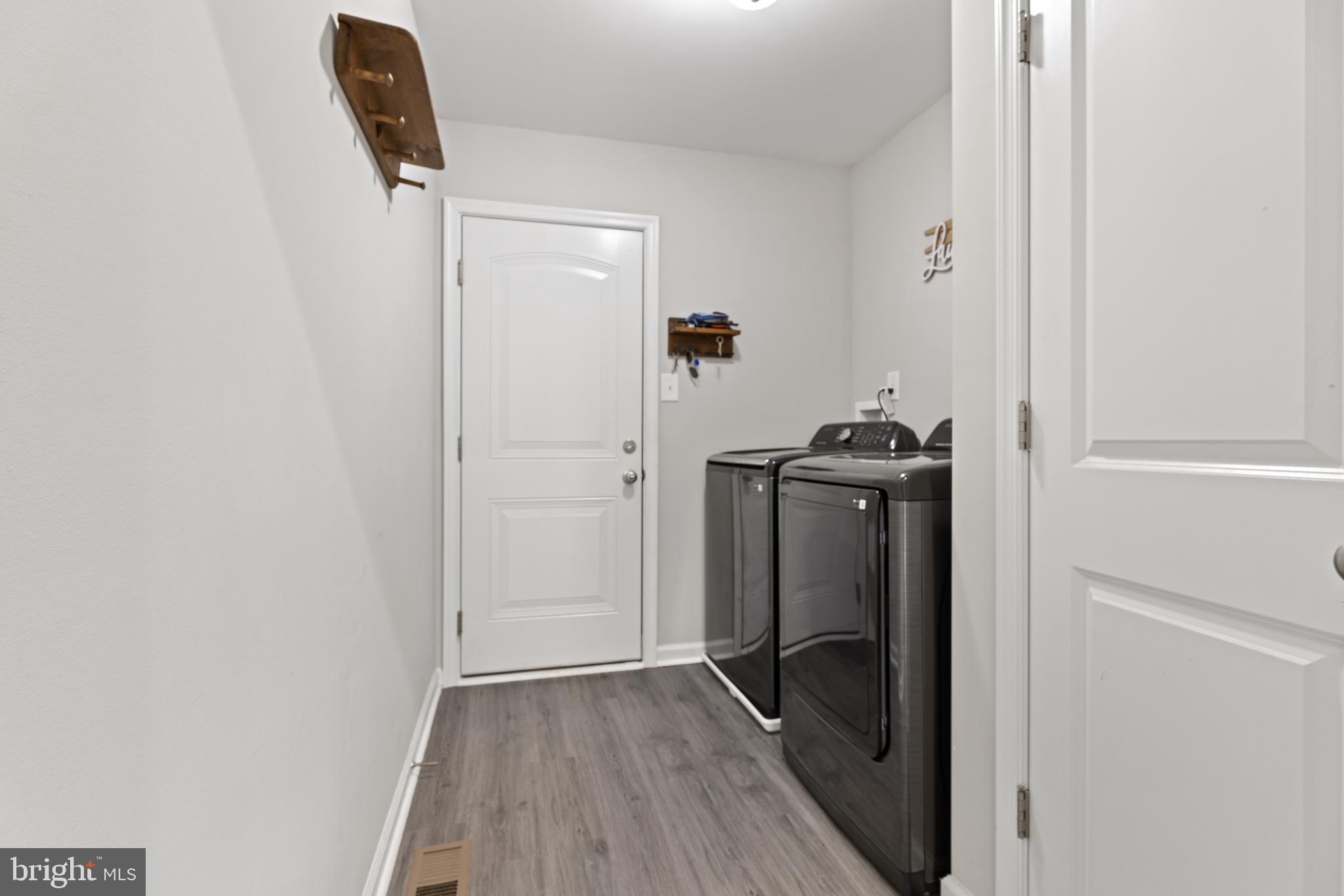 61 MDG Court Berkeley Springs, WV 25411 - Photo 27 of 47 wooden floor in an empty room