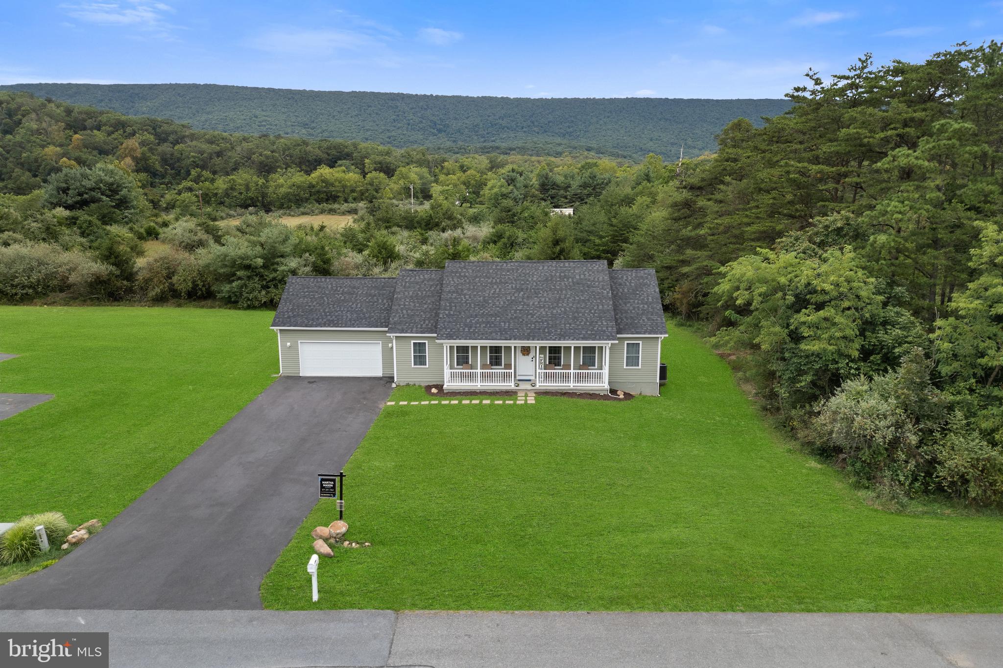 61 MDG Court Berkeley Springs, WV 25411 - Photo 6 of 47 an aerial view of a house