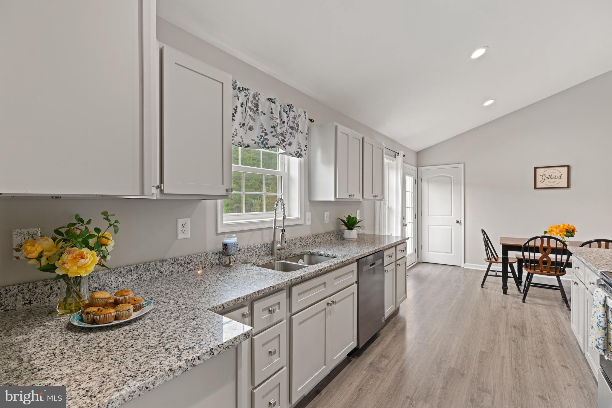 61 MDG Court Berkeley Springs, WV 25411 - Photo 7 of 47 a kitchen with sink and view of living room
