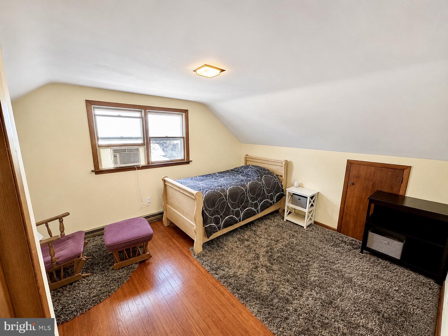 487 Prospect Road Manheim, PA 17545 - Photo 9 of 24 a bedroom with a bed and wooden floor