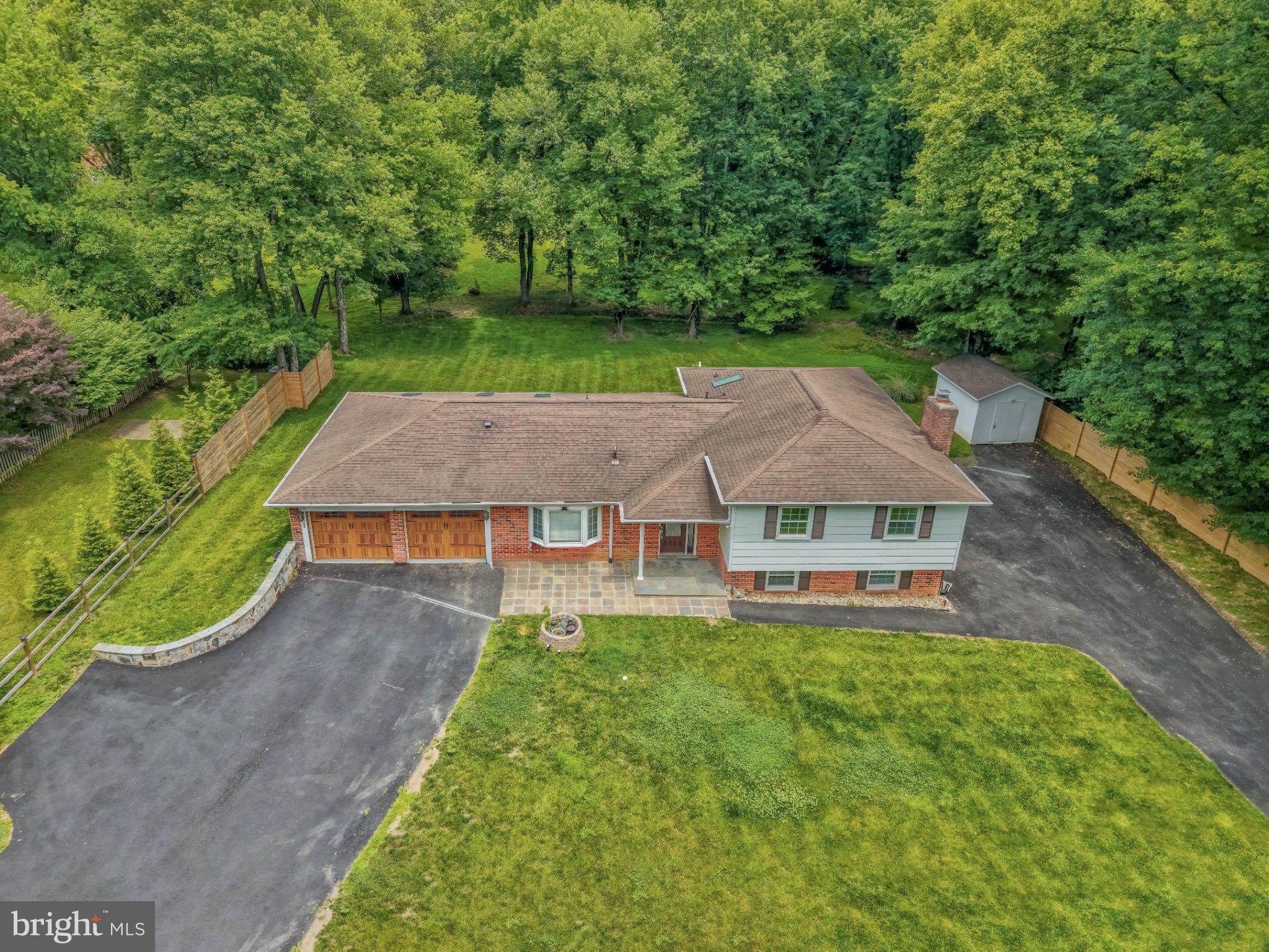 3219 Fox Mill Road Oakton, VA 22124 - Photo 81 of 87 Charming home nestled in lush greenery.
