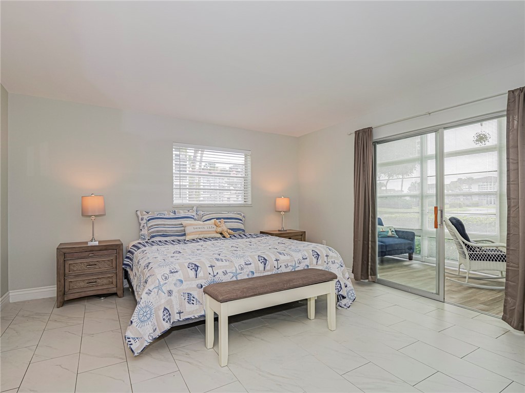 5400 Highway A1a, Unit D3 Vero Beach, FL 32963 - Photo 13 of 35 a bedroom with a bed and a view of bedroom