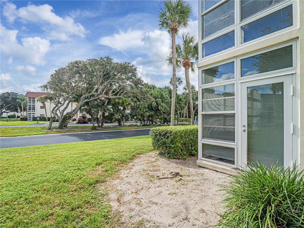 5400 Highway A1a, Unit D3 Vero Beach, FL 32963 - Photo 3 of 35 a view of pool with outdoor seating and plants