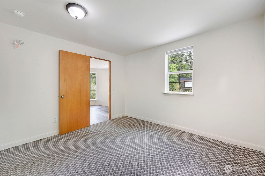 196 Nolton Road Nordland, WA 98358 - Photo 13 of 39 an empty room with windows