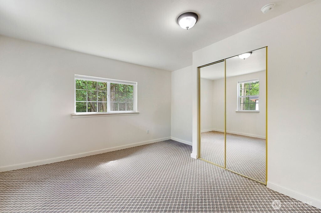 196 Nolton Road Nordland, WA 98358 - Photo 14 of 39 a view of an empty room with a window