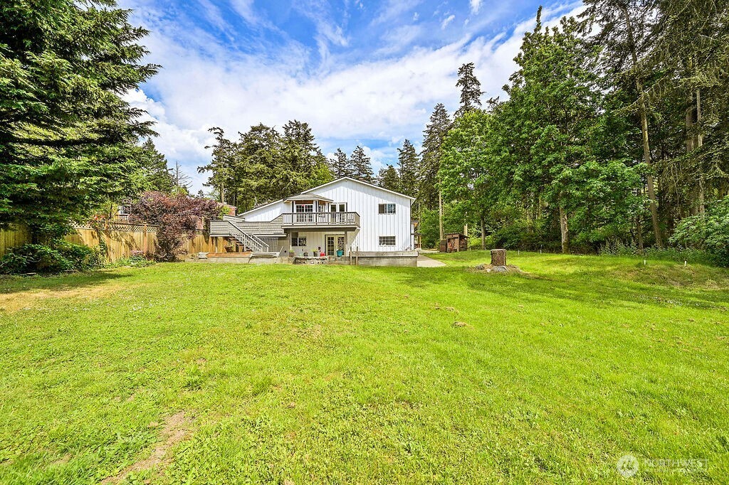 196 Nolton Road Nordland, WA 98358 - Photo 31 of 39 a house view with swimming pool in front of it