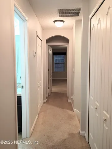 a view of a hallway with a hallway