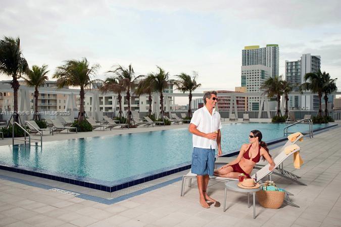 79 Southwest 12th Street, Unit 2512S Miami, FL 33130 - Photo 30 of 36 a outdoor space with lots of swings and slides