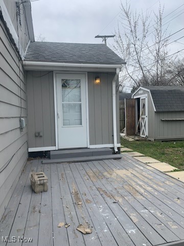 284 Altamont Road Vermilion, OH 44089 - Photo 7 of 39 Wooden terrace featuring an outbuilding and a storage unit