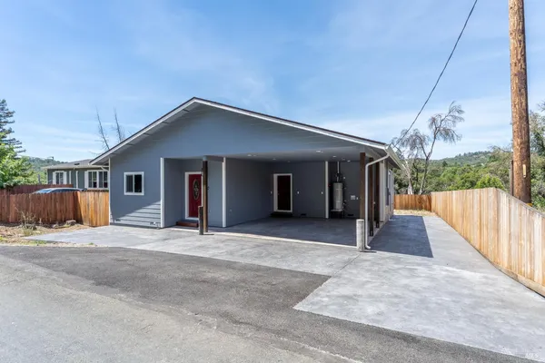 a front view of a house having yard