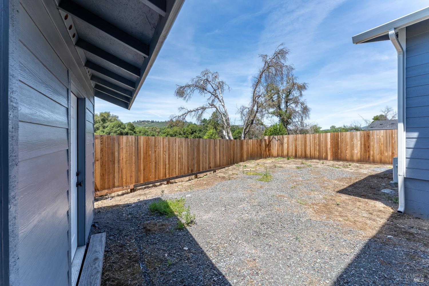 6100 Eastside Calpella Road Ukiah, CA 95482 - Photo 14 of 16 a backyard of a house with lots of green space