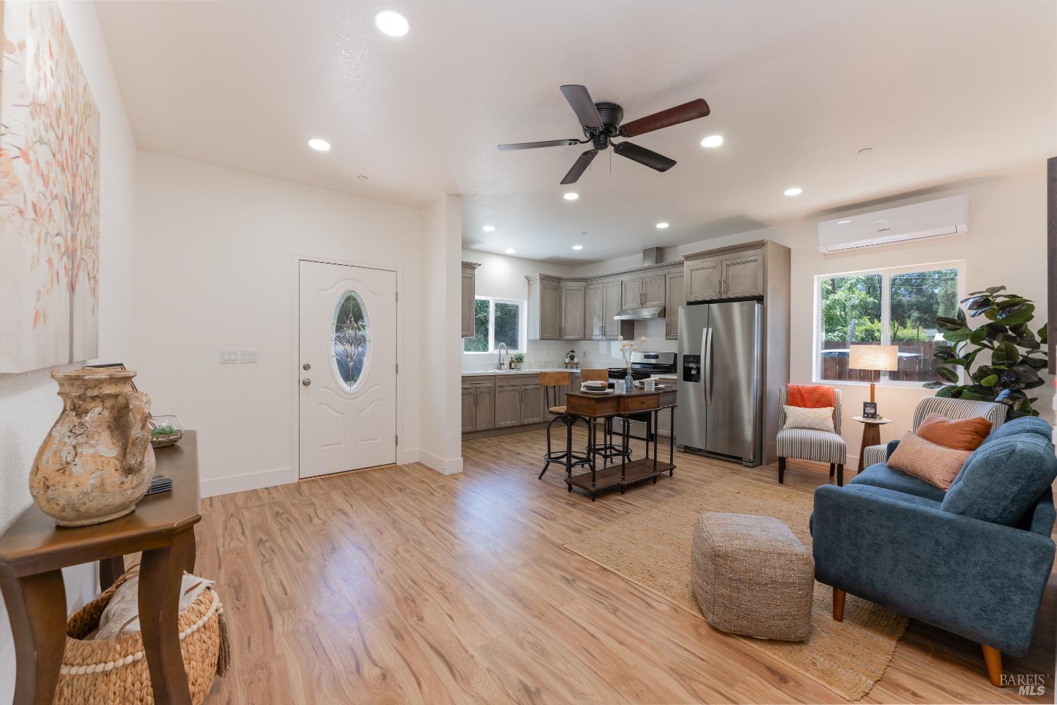 6100 Eastside Calpella Road Ukiah, CA 95482 - Photo 3 of 16 a living room with furniture and kitchen view