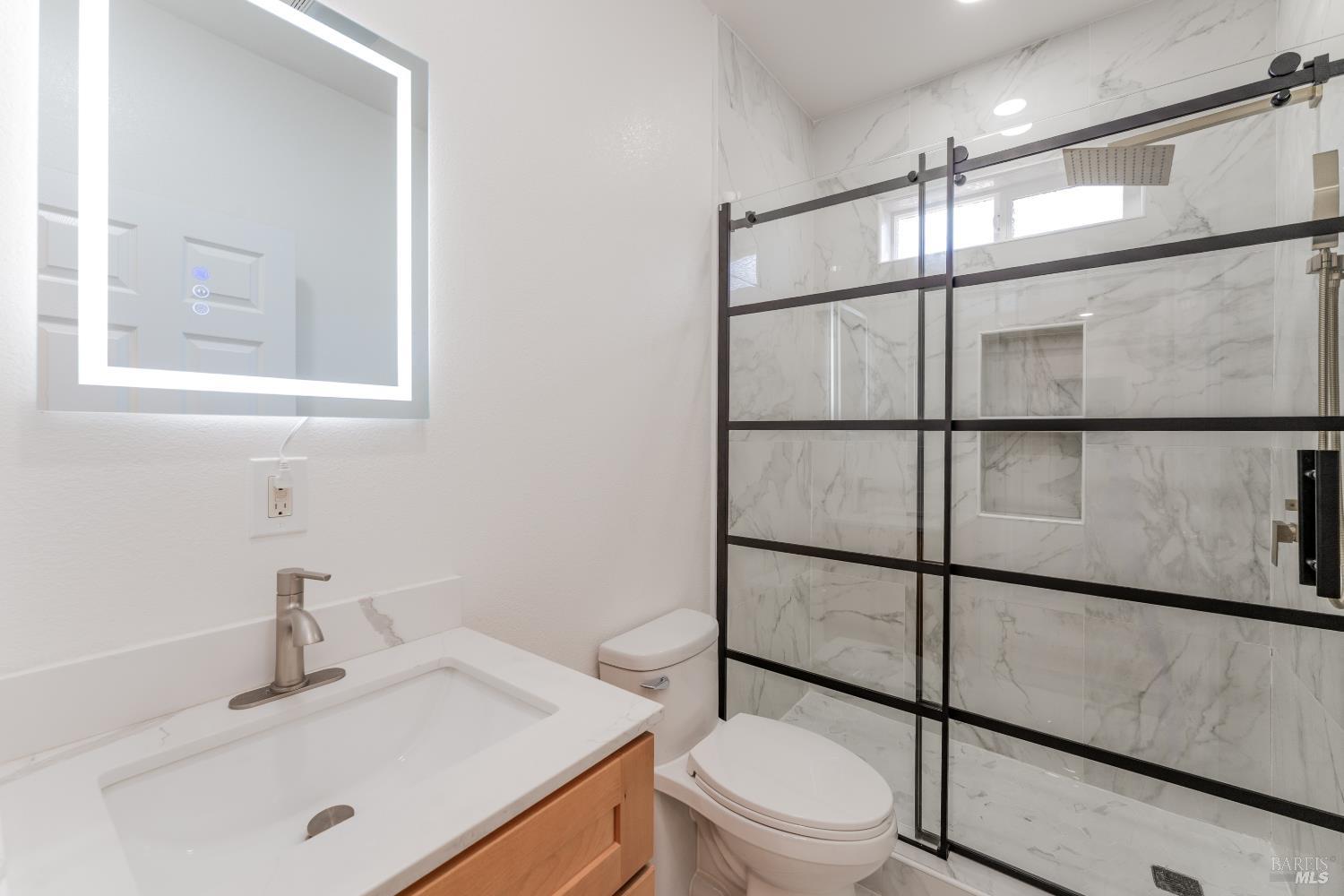 6100 Eastside Calpella Road Ukiah, CA 95482 - Photo 6 of 16 a bathroom with a sink toilet vanity and tub