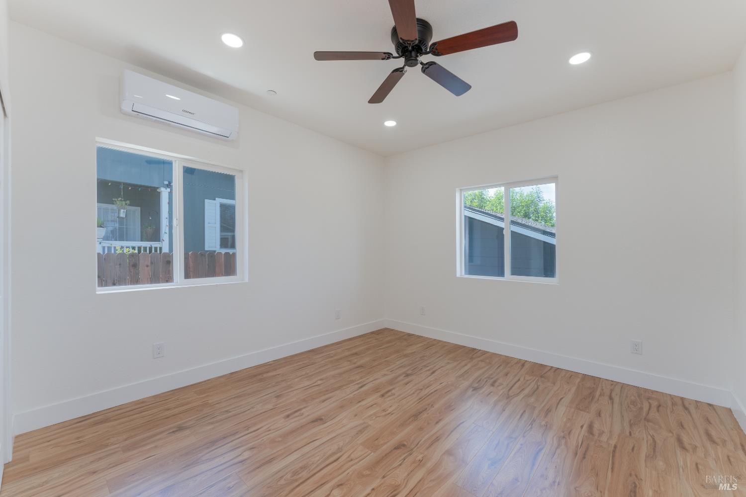 6100 Eastside Calpella Road Ukiah, CA 95482 - Photo 8 of 16 a view of empty room with wooden floor and fan