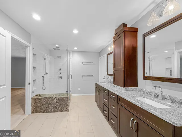 a view of an empty room with a cabinet