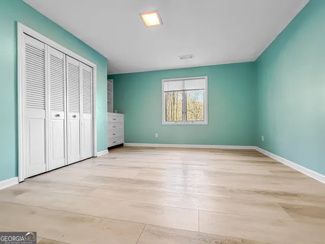 a bathroom with a toilet and a sink