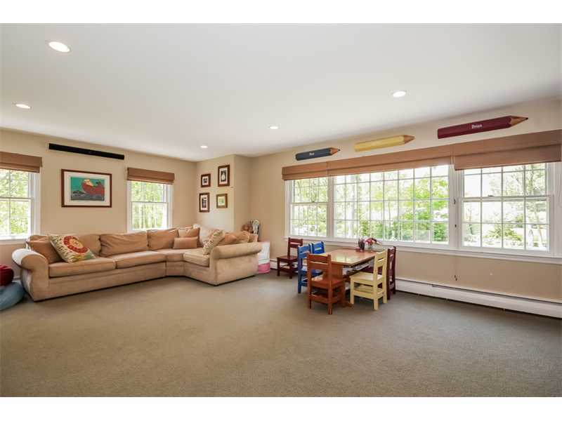 383 Middlesex Road Darien, CT 06820 - Photo 12 of 23 a living room with furniture and large windows