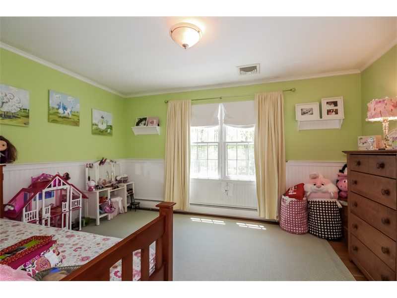 383 Middlesex Road Darien, CT 06820 - Photo 16 of 23 a bedroom with furniture and a bed