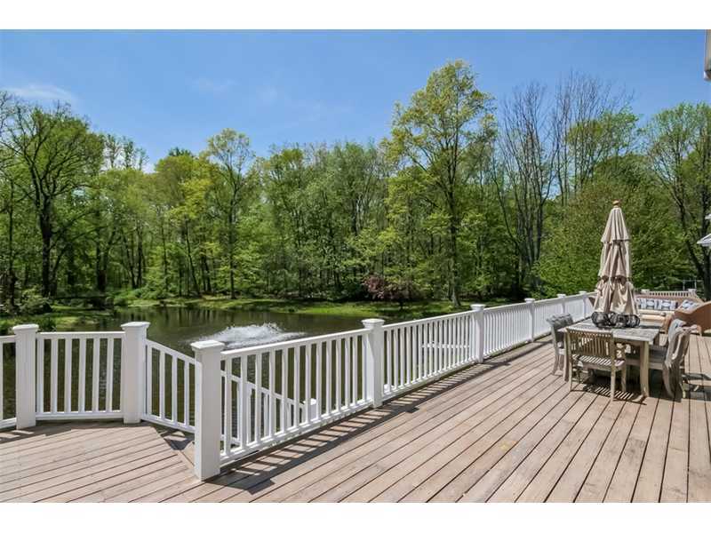 383 Middlesex Road Darien, CT 06820 - Photo 18 of 23 a view of a chairs and table on the wooden floor