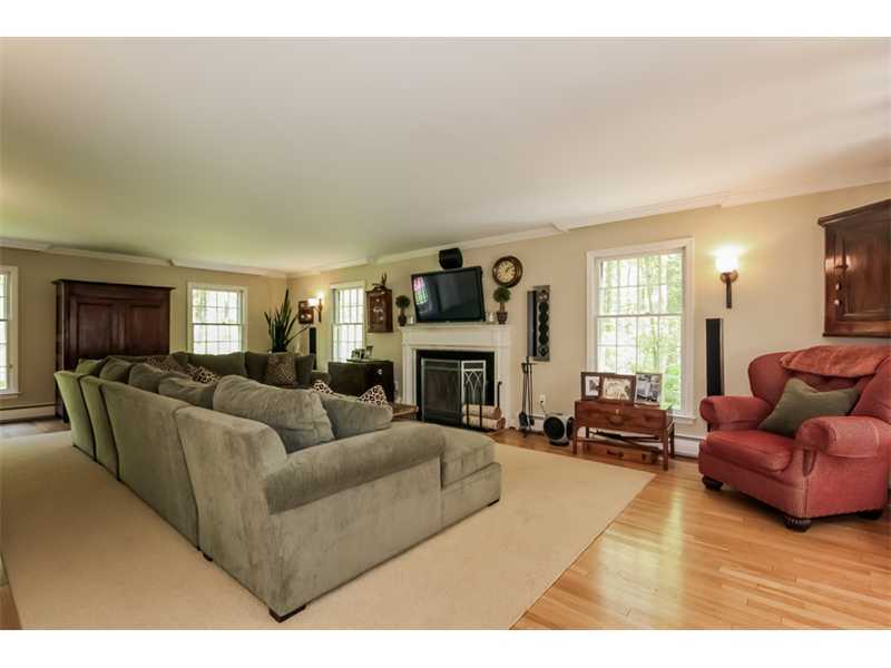 383 Middlesex Road Darien, CT 06820 - Photo 3 of 23 a living room with furniture window and a fireplace