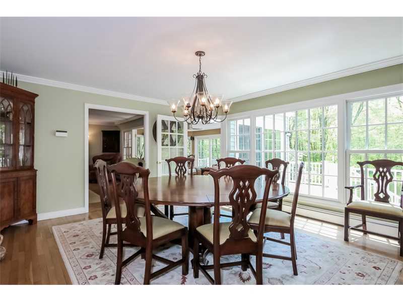 383 Middlesex Road Darien, CT 06820 - Photo 4 of 23 a view of a dining room with furniture window and wooden floor