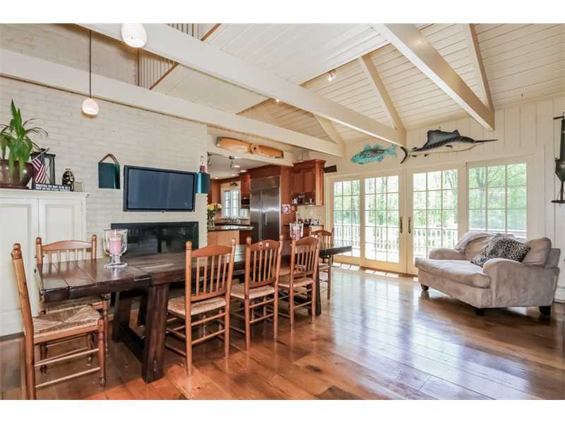 383 Middlesex Road Darien, CT 06820 - Photo 6 of 23 a view of a dining room with furniture window and wooden floor
