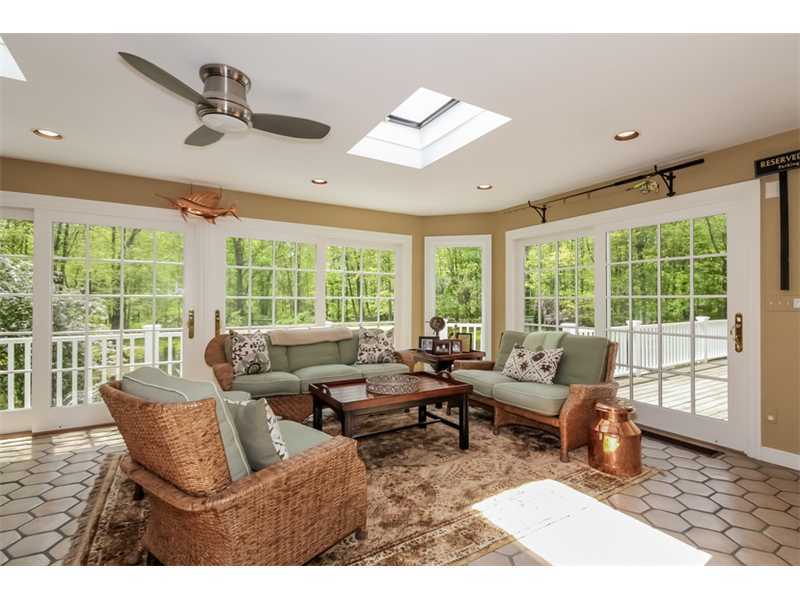 383 Middlesex Road Darien, CT 06820 - Photo 9 of 23 a living room with furniture and a large window
