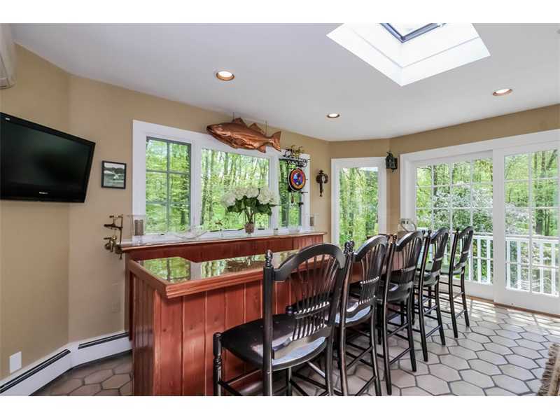 383 Middlesex Road Darien, CT 06820 - Photo 10 of 23 a view of a livingroom with furniture window and outside view