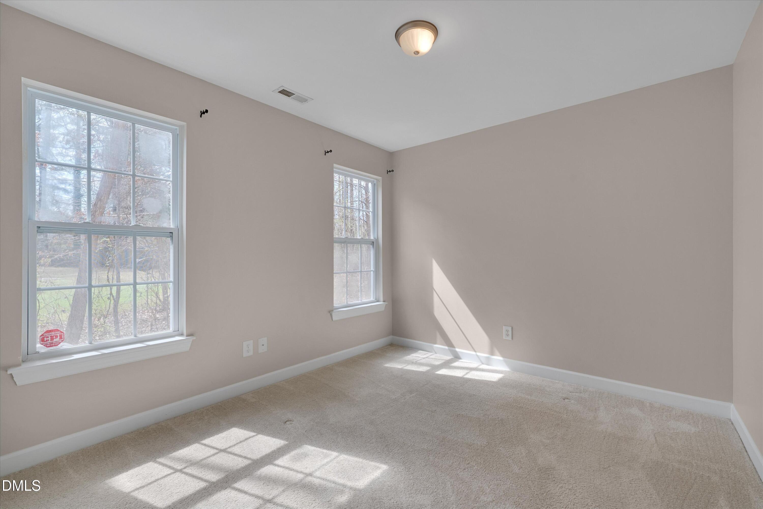 2604 Spring Drive Raleigh, NC 27610 - Photo 11 of 23 One of the Three Bedrooms