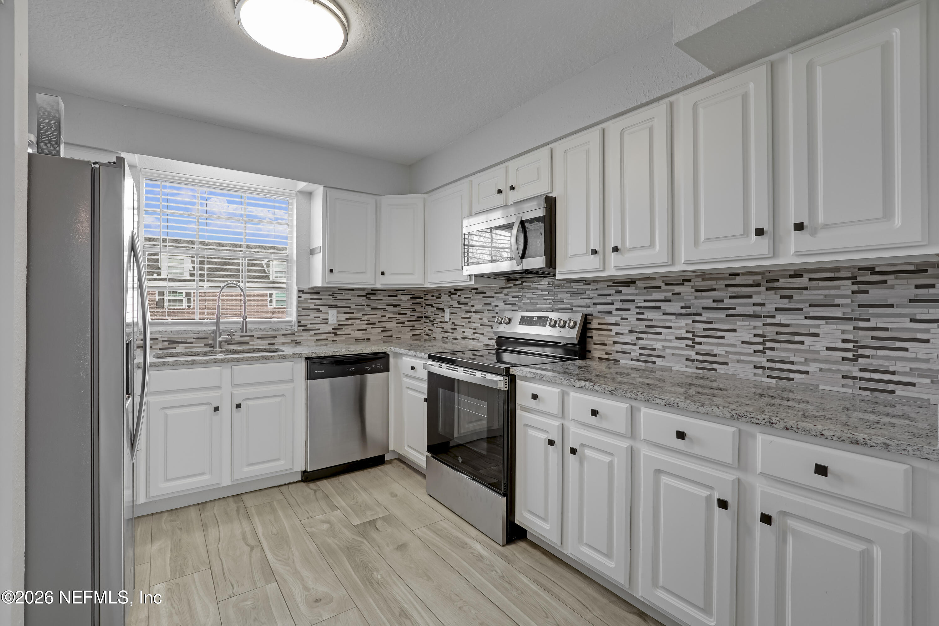 4915 Baymeadows Road, Unit 8H Jacksonville, FL 32217 - Photo 2 of 40 01 Kitchen