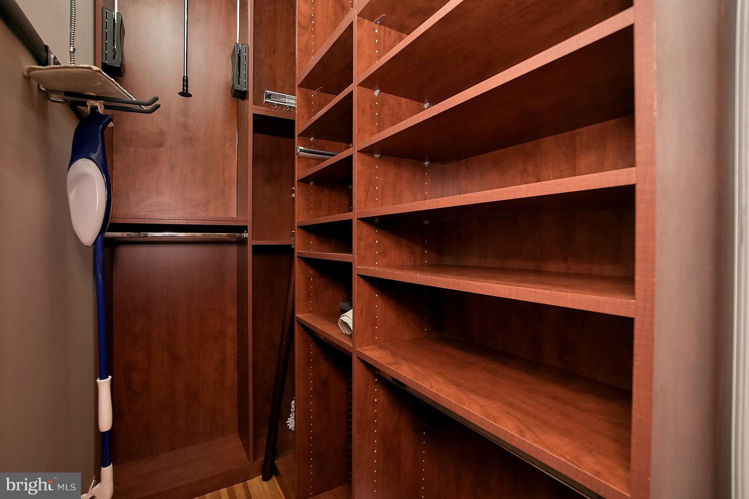 2220 20th Street Northwest, Unit 32 Washington, DC 20009 - Photo 11 of 20 a view of walk in closet with clothes and shoes