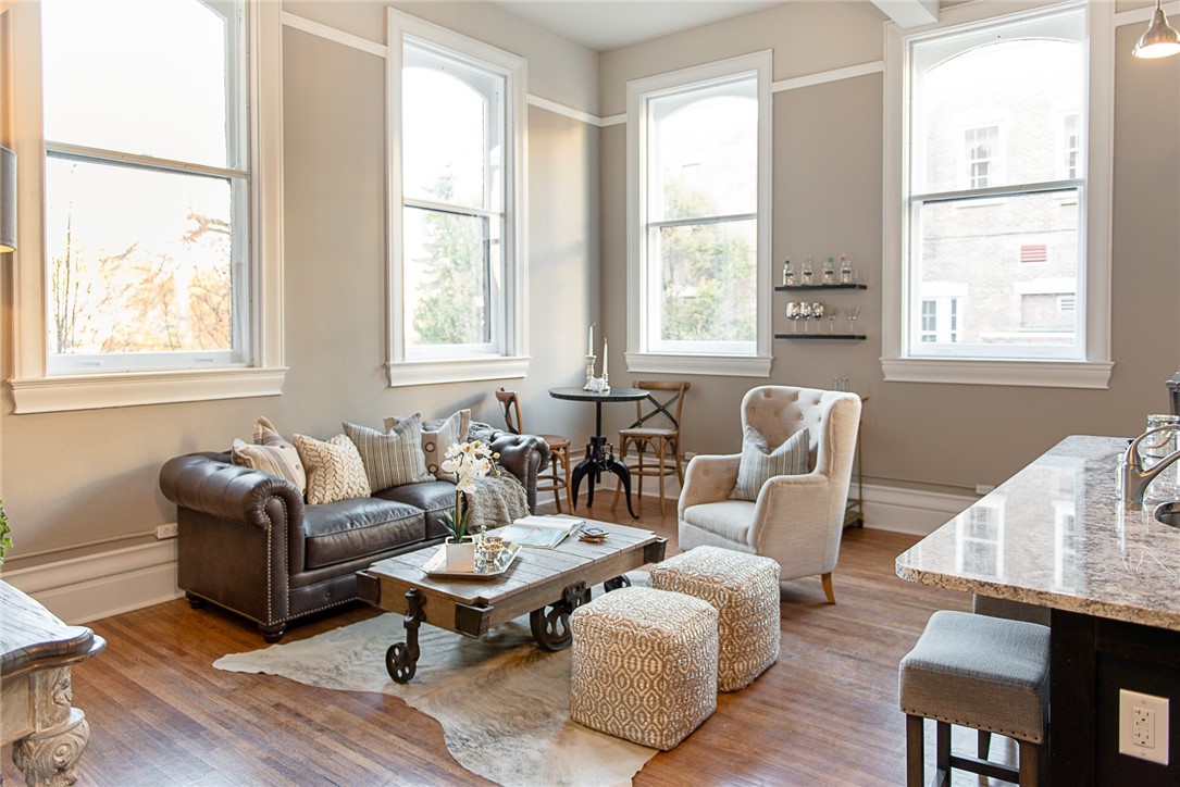 300 Alexander Street, Unit 401 Rochester, NY 14607 - Photo 2 of 9 Typical large Great Room with lots of light, high