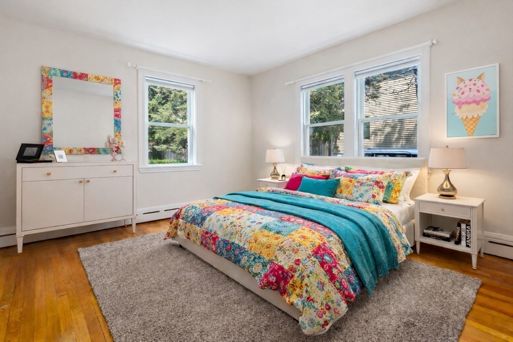 29 Boulevard Road Dedham, MA 02026 - Photo 15 of 34 a bedroom with a bed and a window