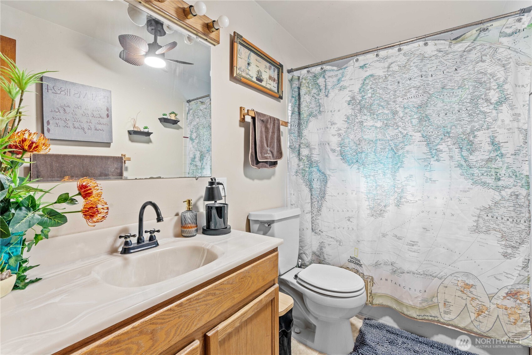 22415 Military Road South SeaTac, WA 98198 - Photo 16 of 31 a bathroom with a sink a toilet and a mirror