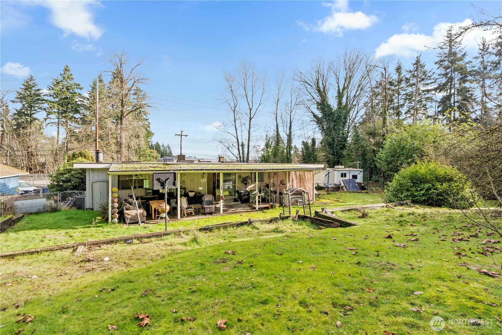 22415 Military Road South SeaTac, WA 98198 - Photo 24 of 31 a view of a house with yard and sitting area