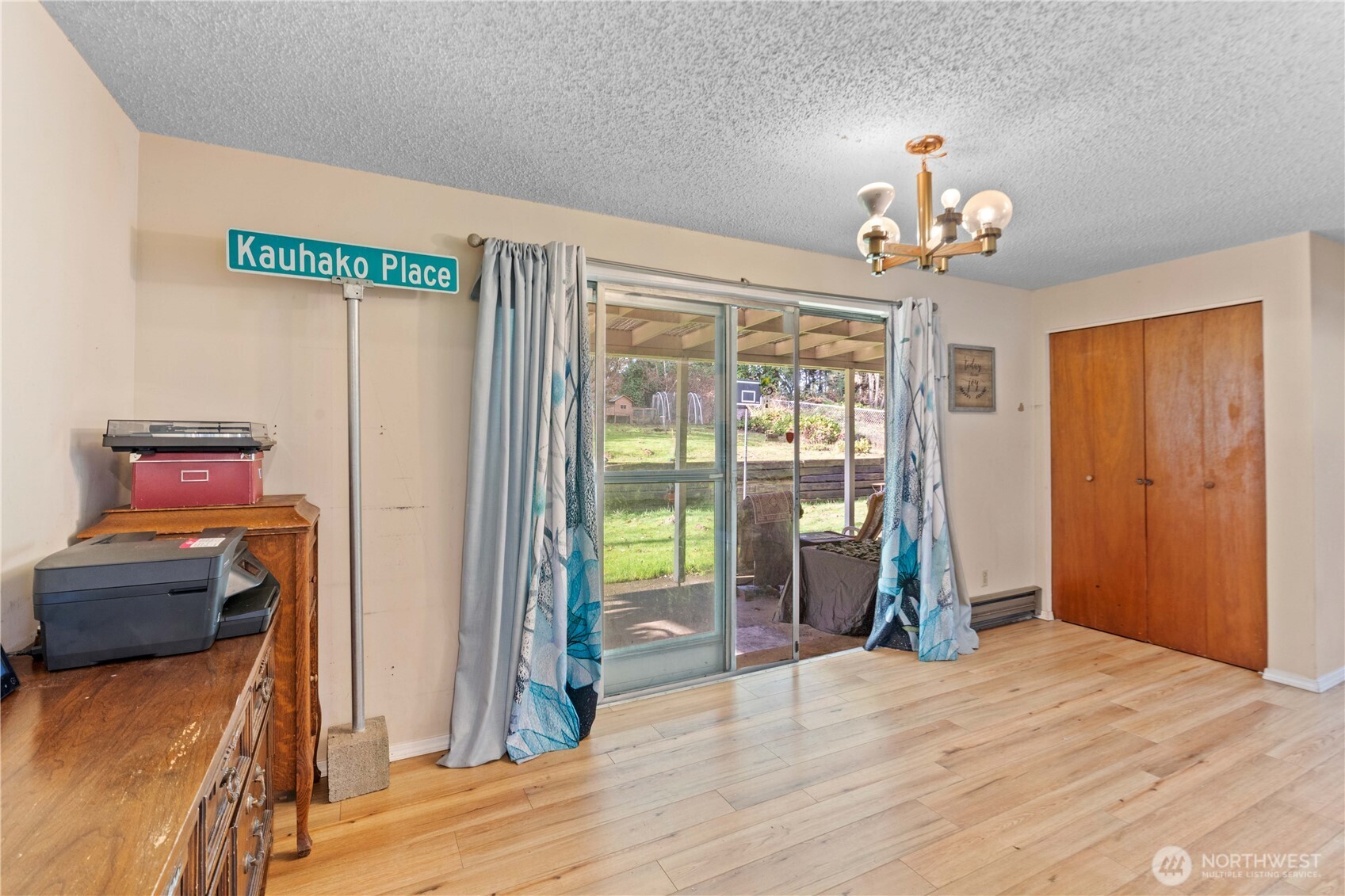 22415 Military Road South SeaTac, WA 98198 - Photo 7 of 31 a view of a livingroom with wooden floor and a window
