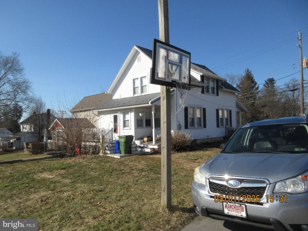 26 West Main Street Fawn Grove, PA 17321 - Photo 2 of 3 a front view of a house with a yard