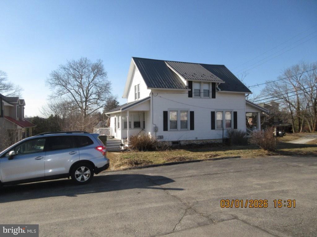 26 West Main Street Fawn Grove, PA 17321 - Photo 3 of 3 a car parked in front of a house