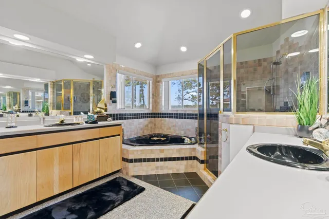 a kitchen with a sink and a stove top oven