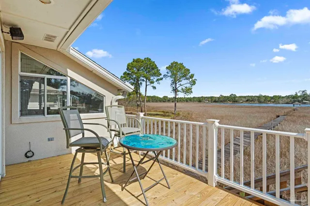a view of a chairs and table on the terrace
