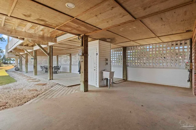 a view of a room with large windows