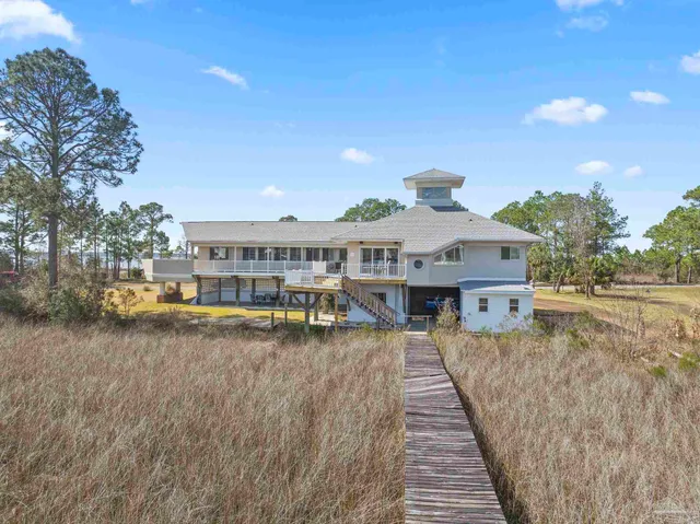 a front view of a house with swimming pool