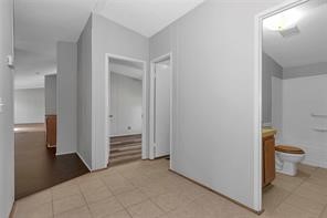 23596 Goode Road Cleveland, TX 77328 - Photo 12 of 14 a view of a bathroom with toilet and a sink